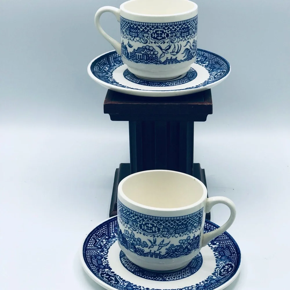 Vintage lot of 2 Blue Willow tea cup and saucer set. Marked U.S.A.